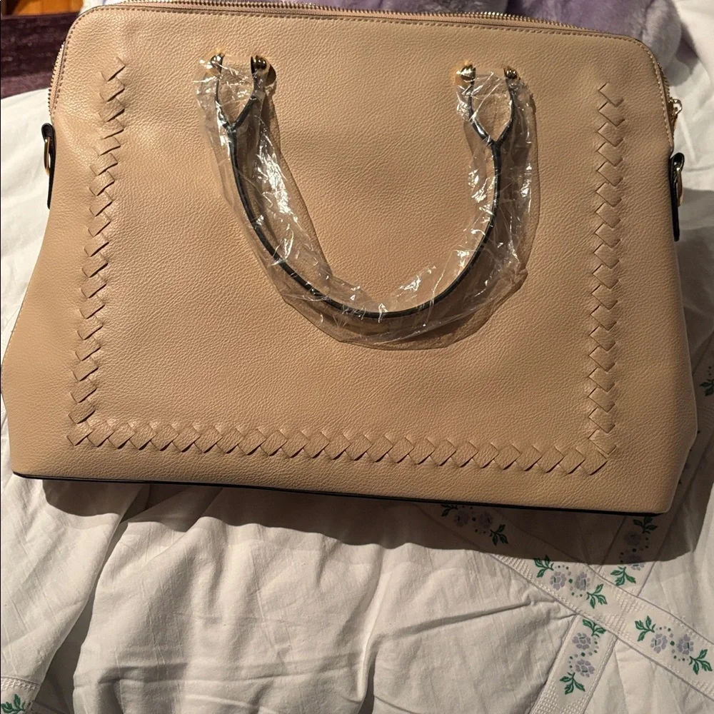 Brand new and never used Elegant Tan Handbag